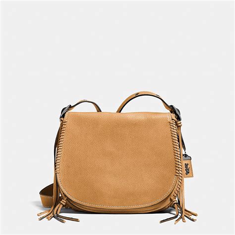 designer crossbody saddle bag.